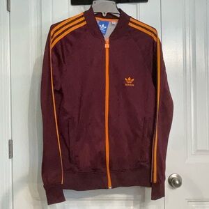 Adidas Burgundy Track Jacket with Orange Stripes